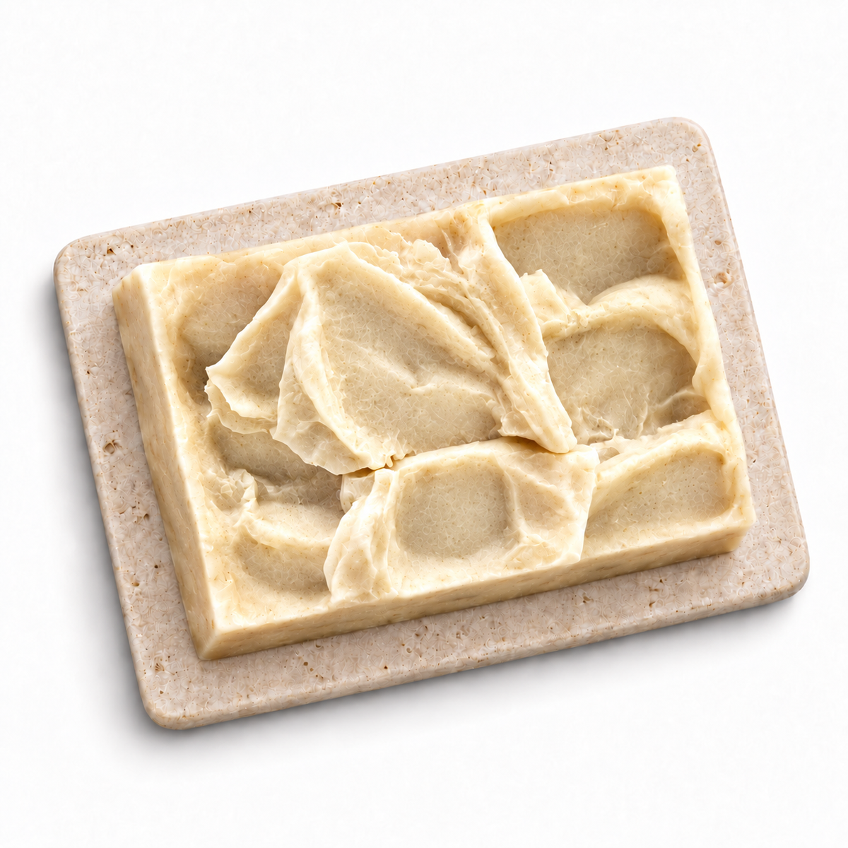 Unblemished Luxe rectangular handmade soap bar, natural texture, white background