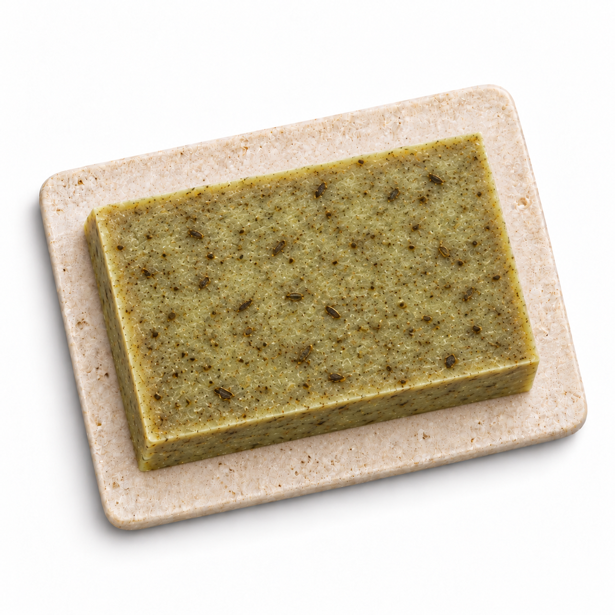 Mugwort Carassee rectangular olive soap bar with natural botanical flecks on a pale stone plate